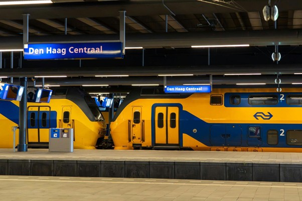 Den Haag Centraal trains during King’s Day travel Netherlands scene
